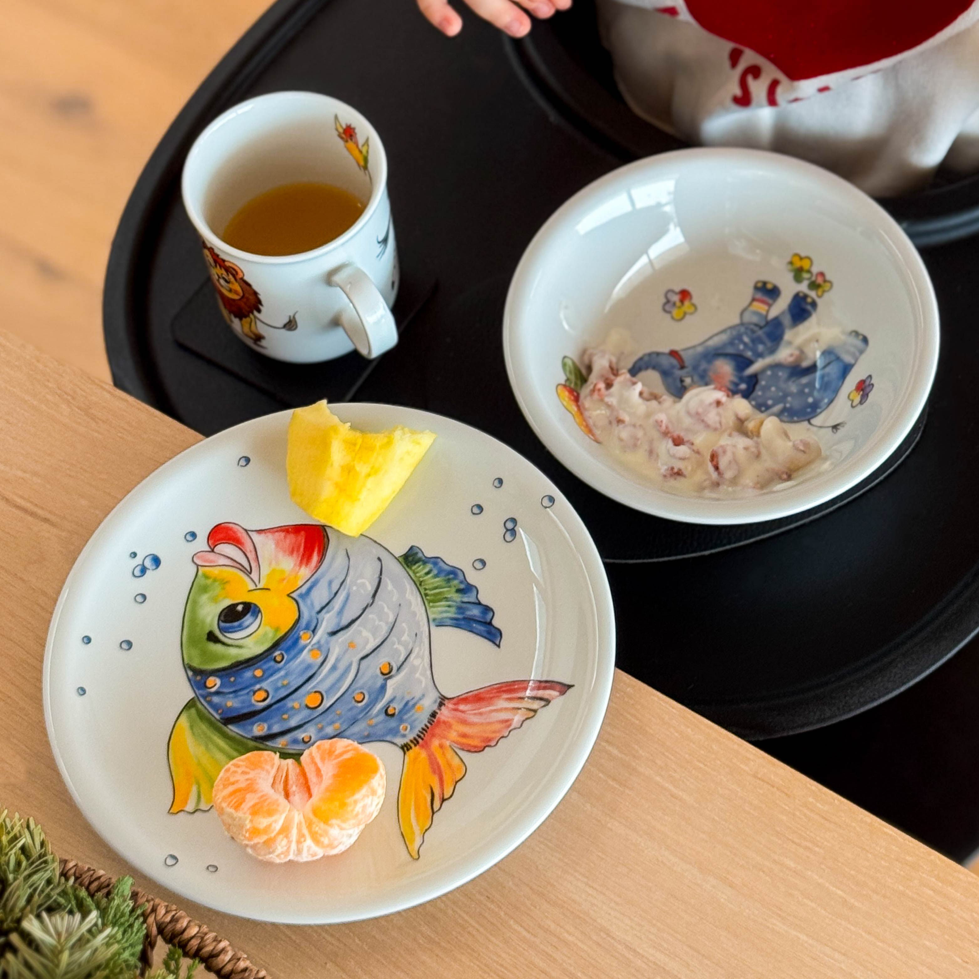 Collection for children with magnet on placemat in high chair
