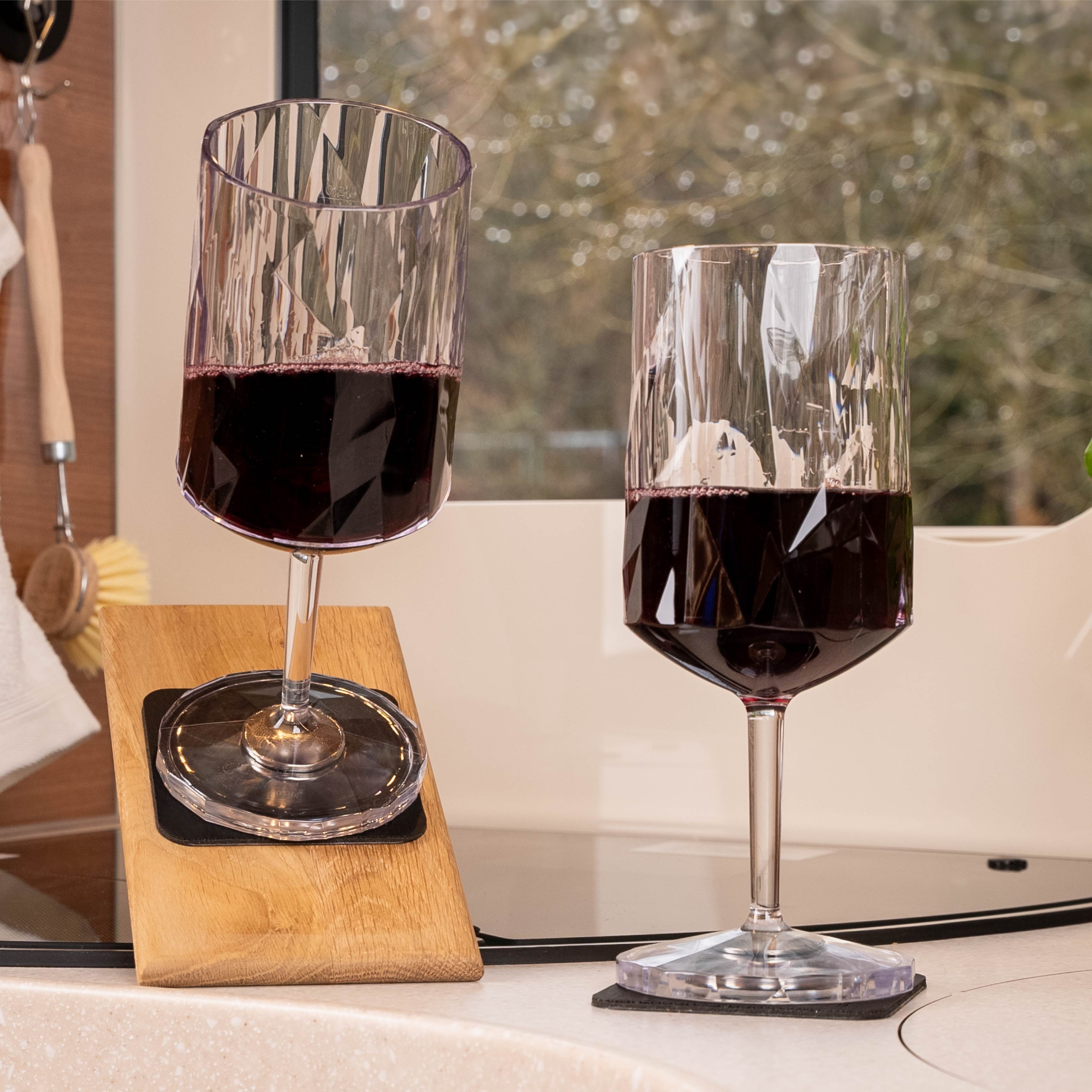 Magnetic plastic glasses wine on pads in an inclined position in a camper