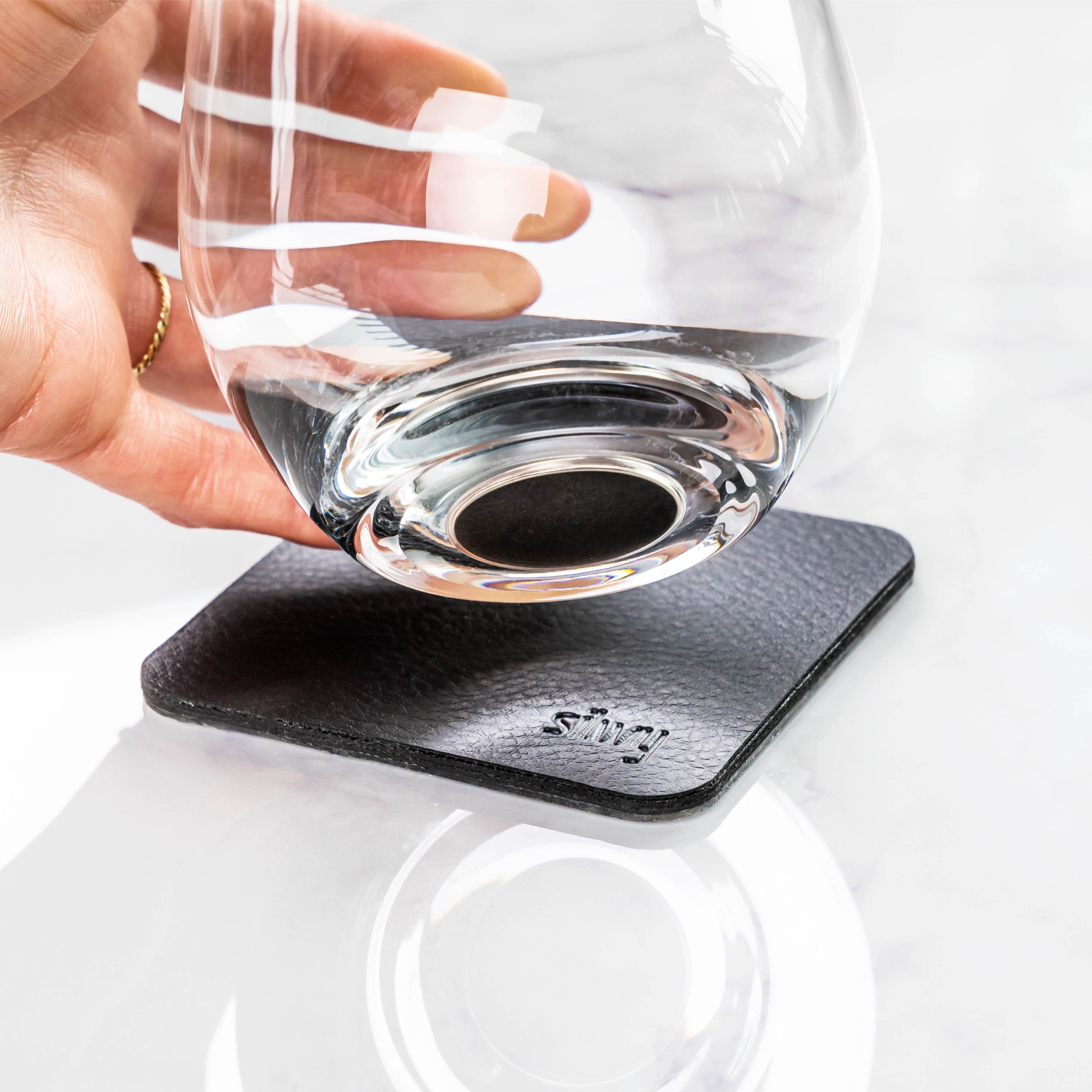 Close-up of magnet in glass base