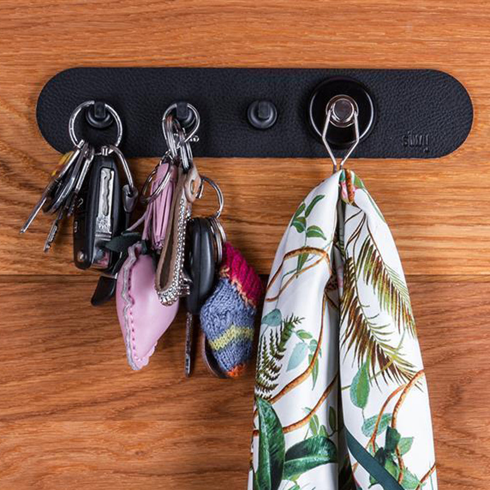 Black Metal Strip with pins and hooks and suspended keys