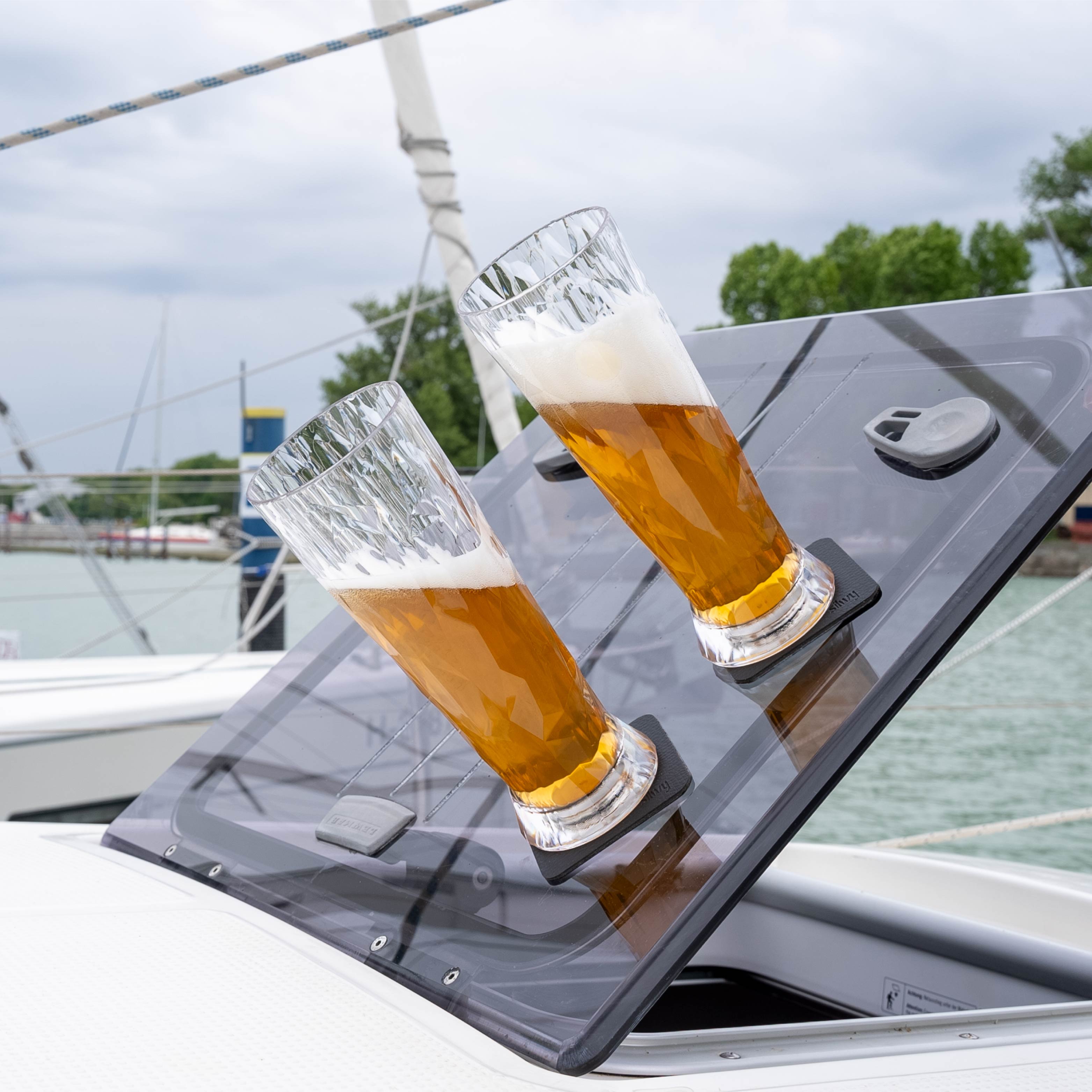 Plastic lenses fixed to pad with magnet - on boat