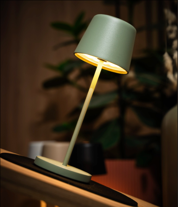 Magnetic table lamp on placemat in inclined position 