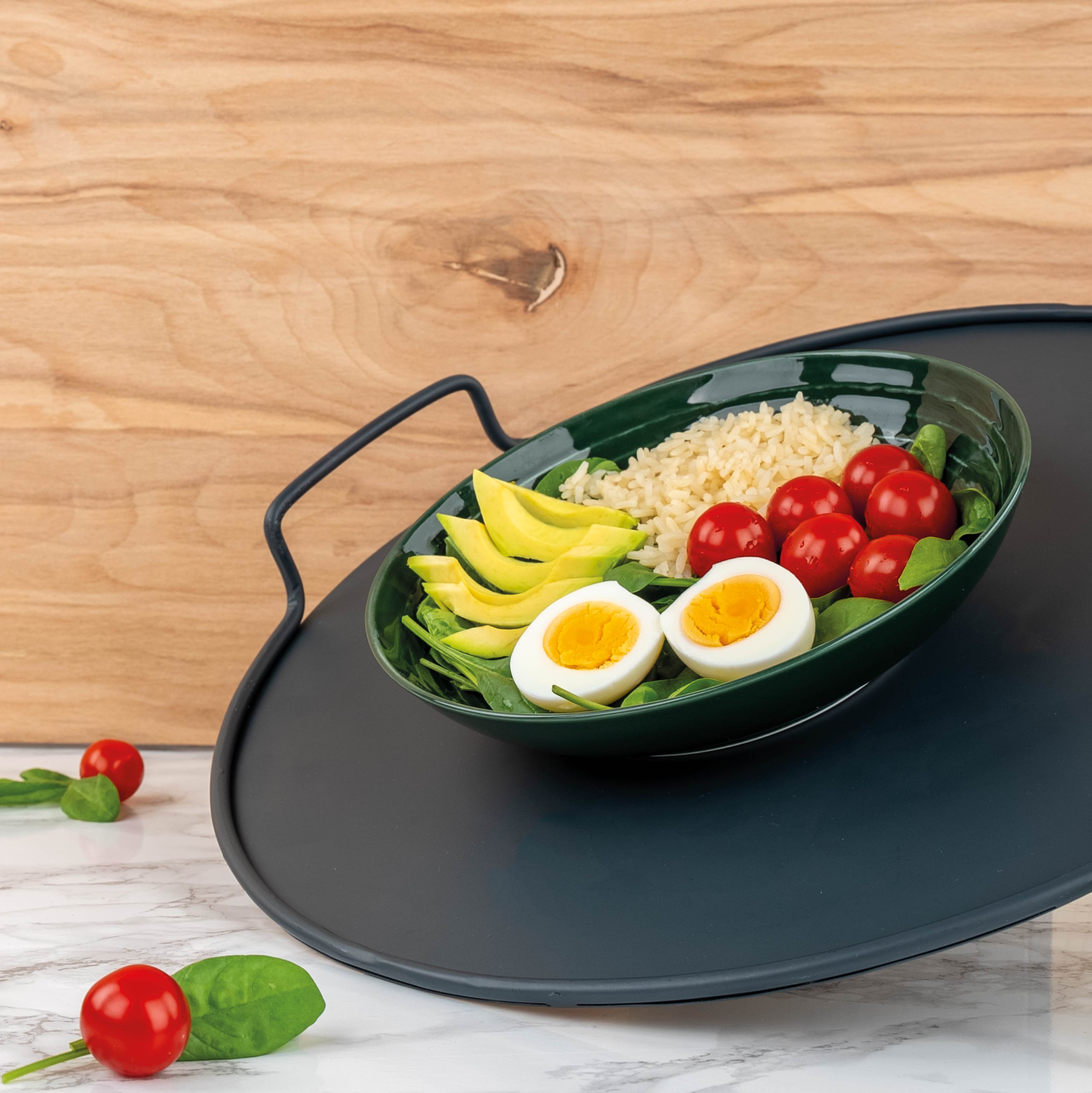 Magnetic bowl is held in place by a metal tray