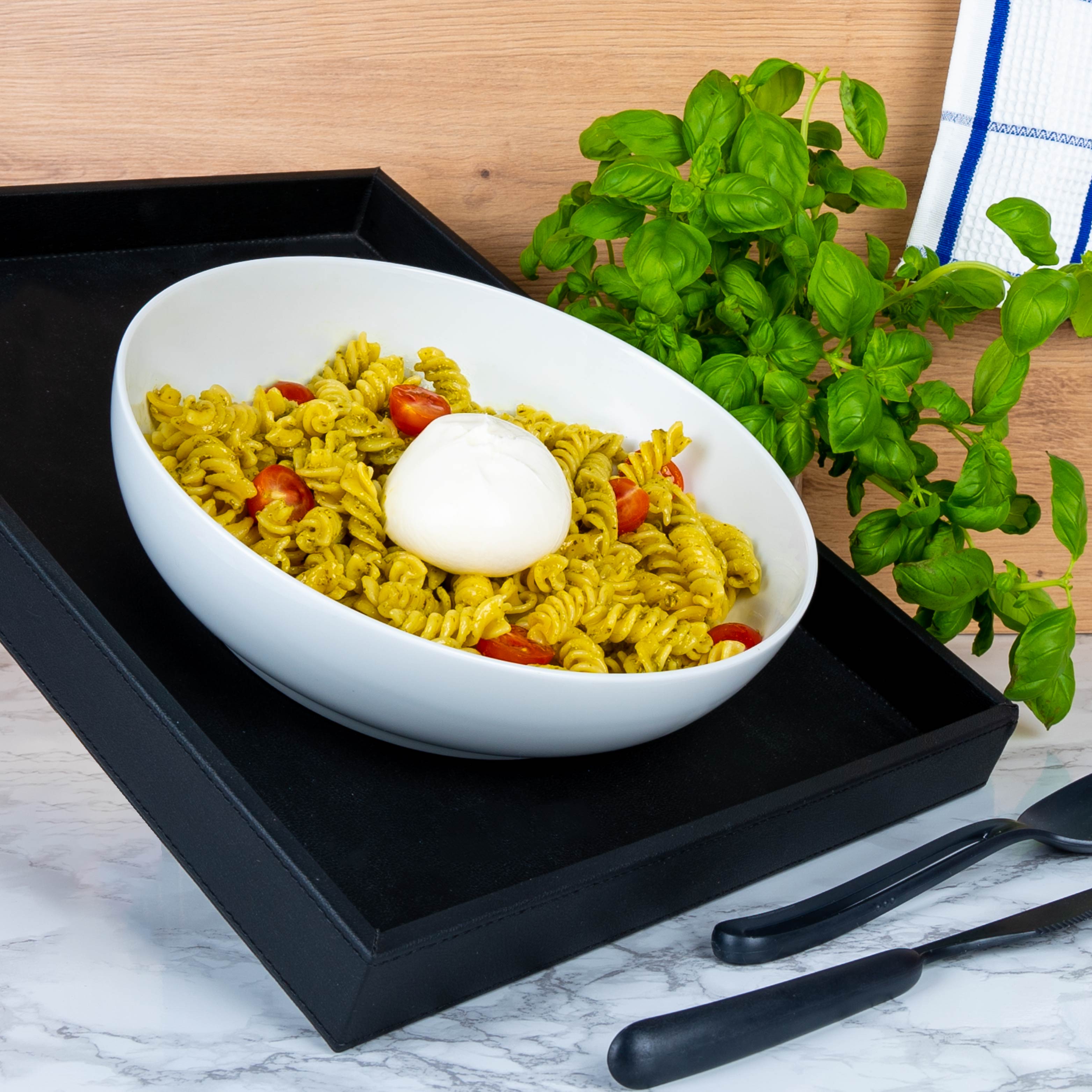 Magnetic porcelain Bowls  bowls classic with pasta with pesto, tomatoes and mozzarella on metal tray