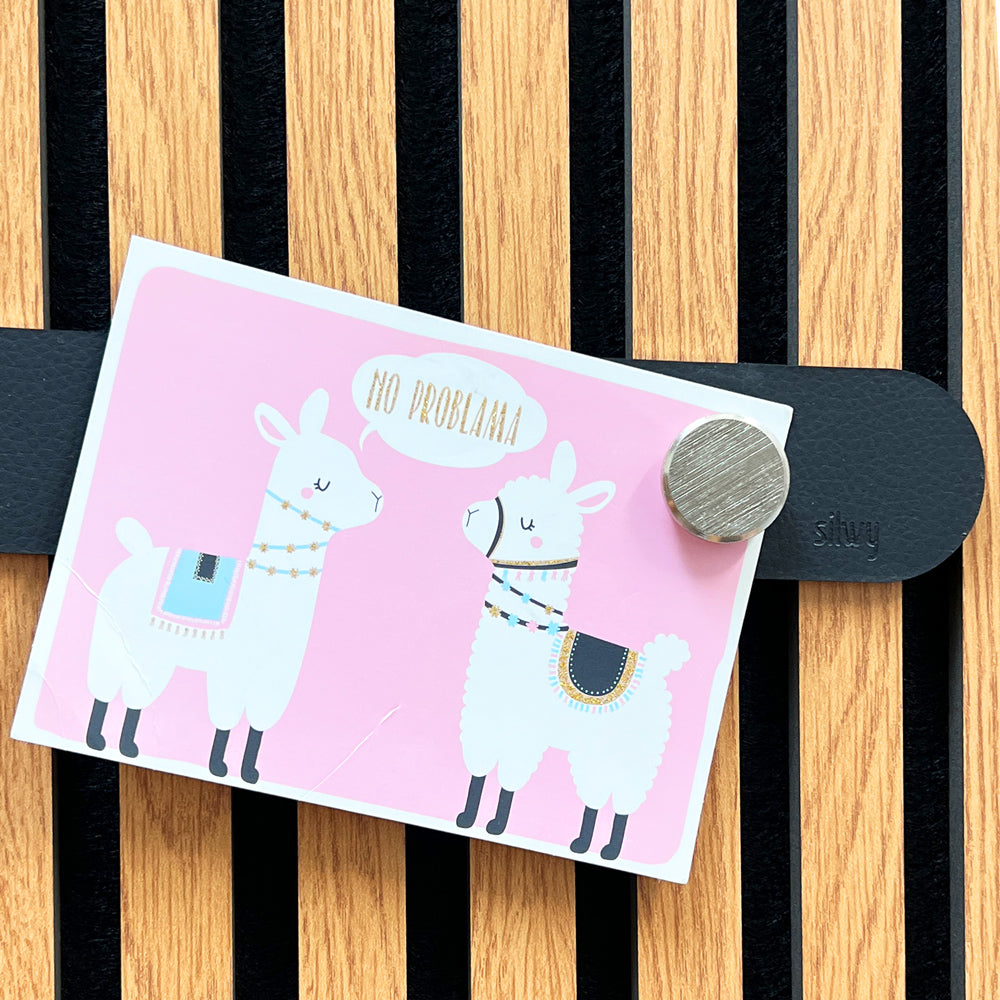 Black Metal Strip with "No problama" card attached by magnet