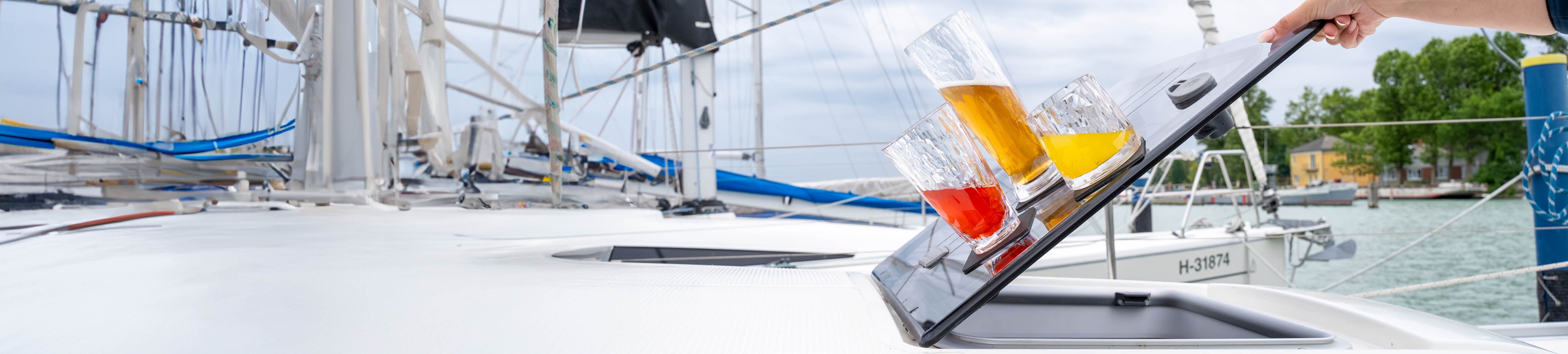 Some plastic glasses fixed to the boat with pads