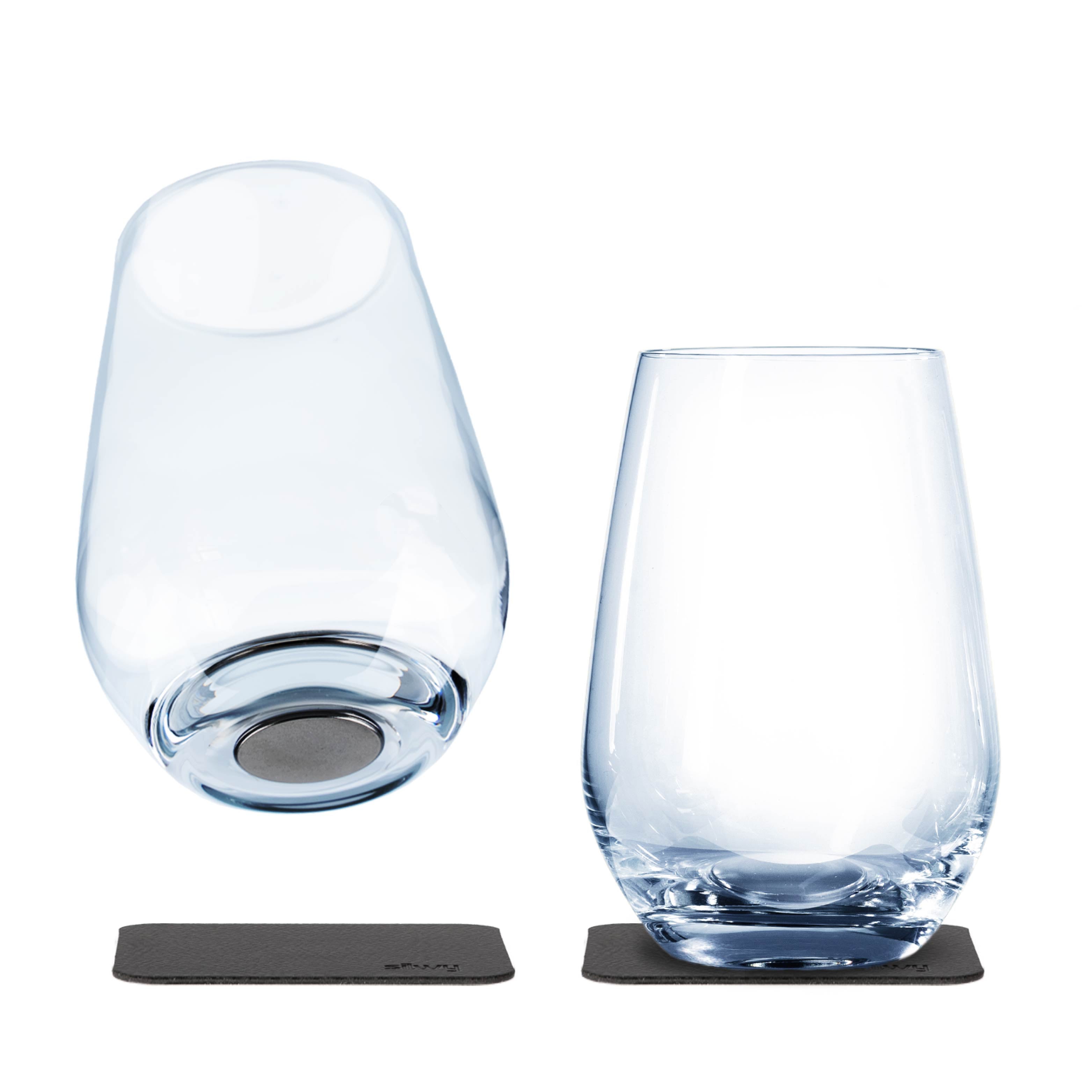 Cut-out of two magnetic crystal glasses long drink on pad