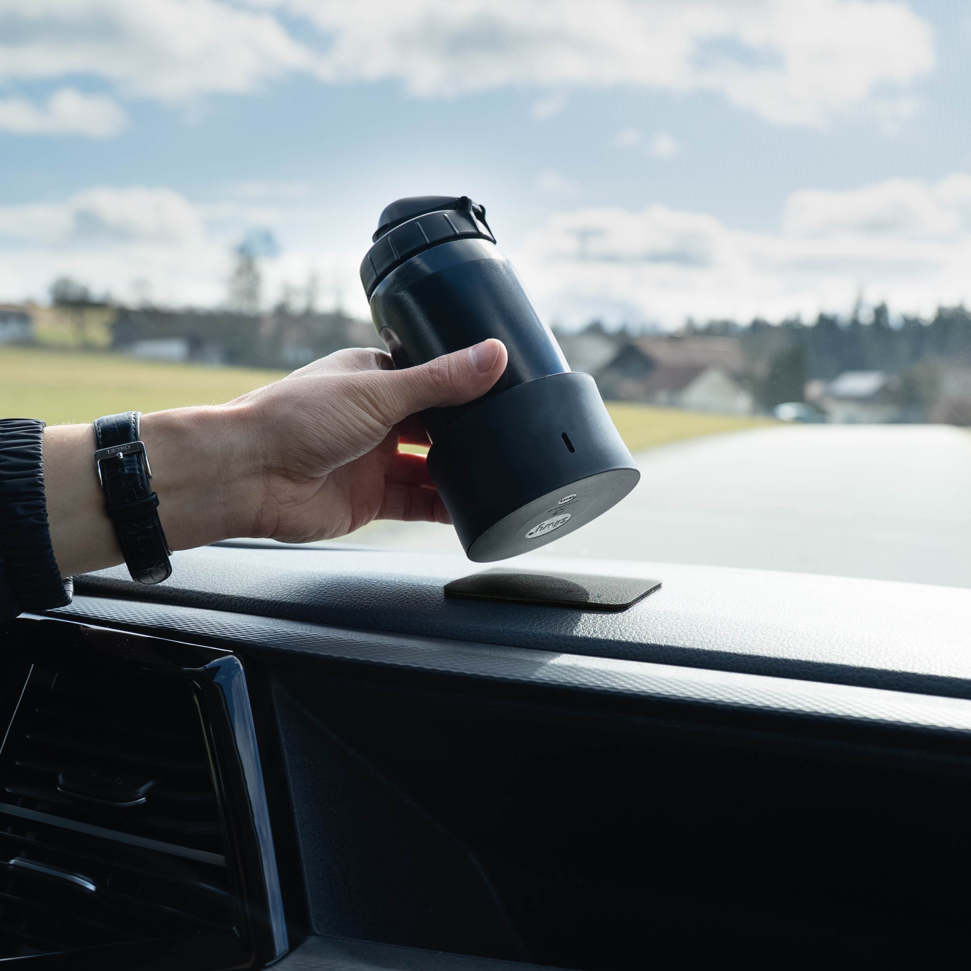Place the Magnetic adapters bottle on the dashboard
