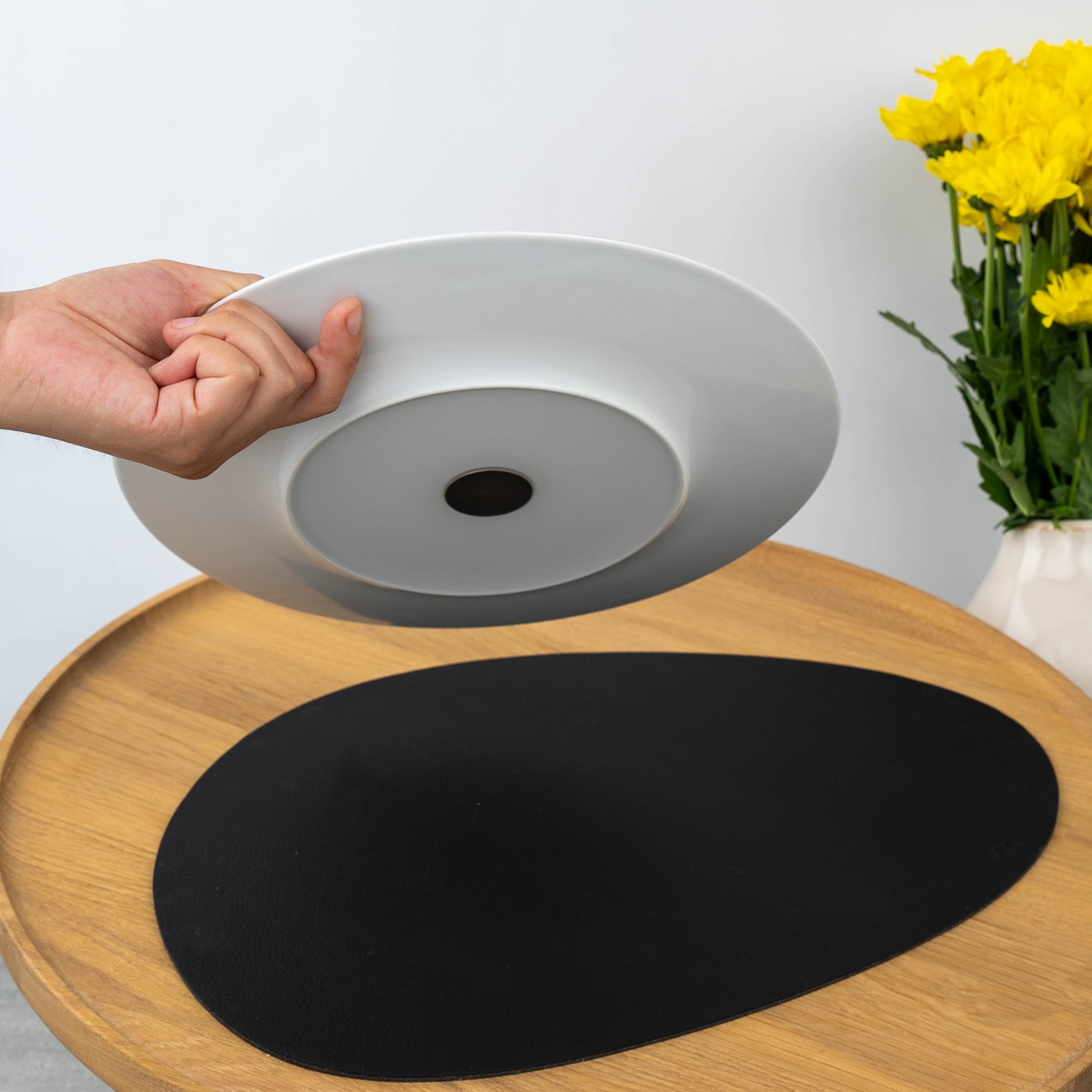 Close-up of magnet in the base of the plate