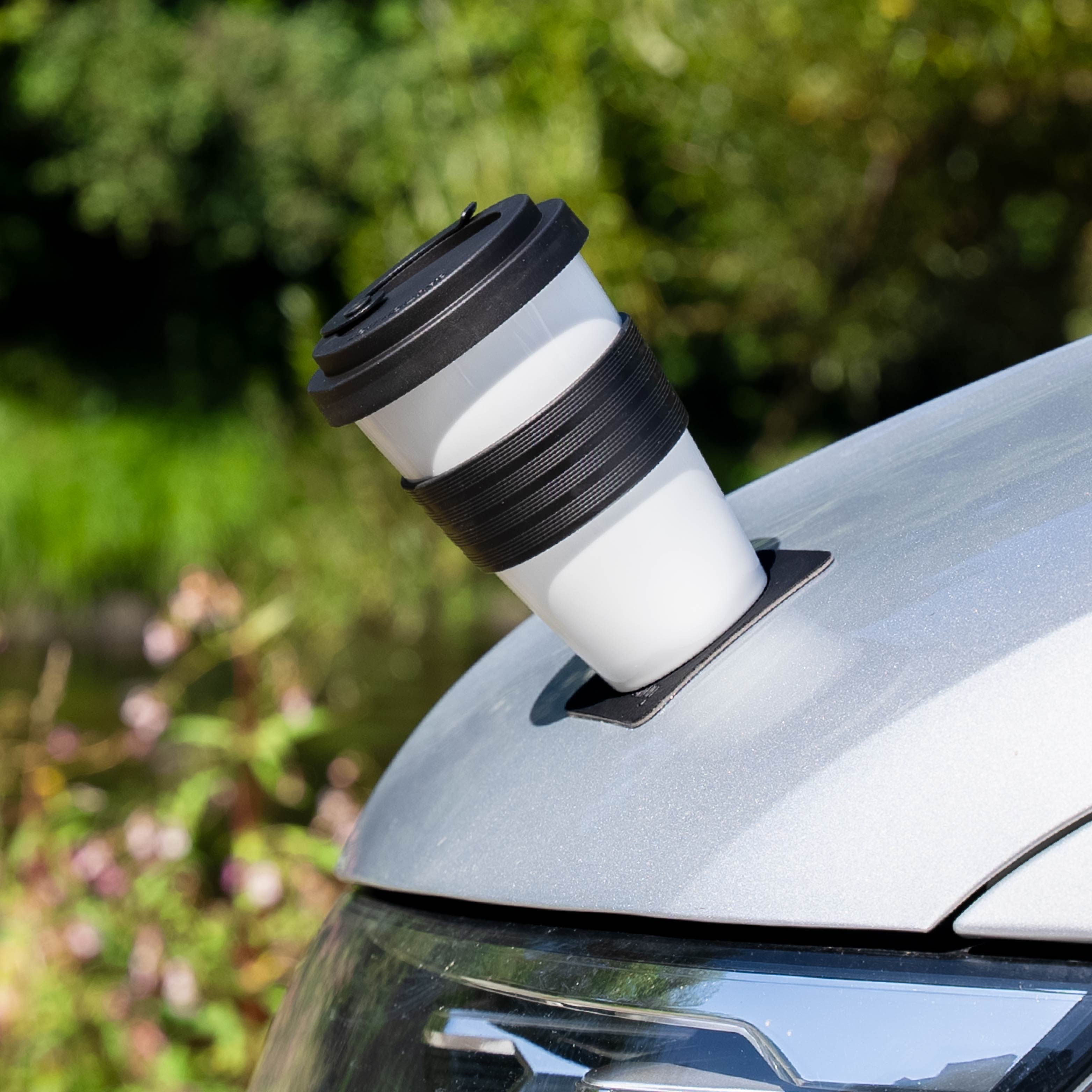 Magnetic porcelain cup is held in place by a metal hood