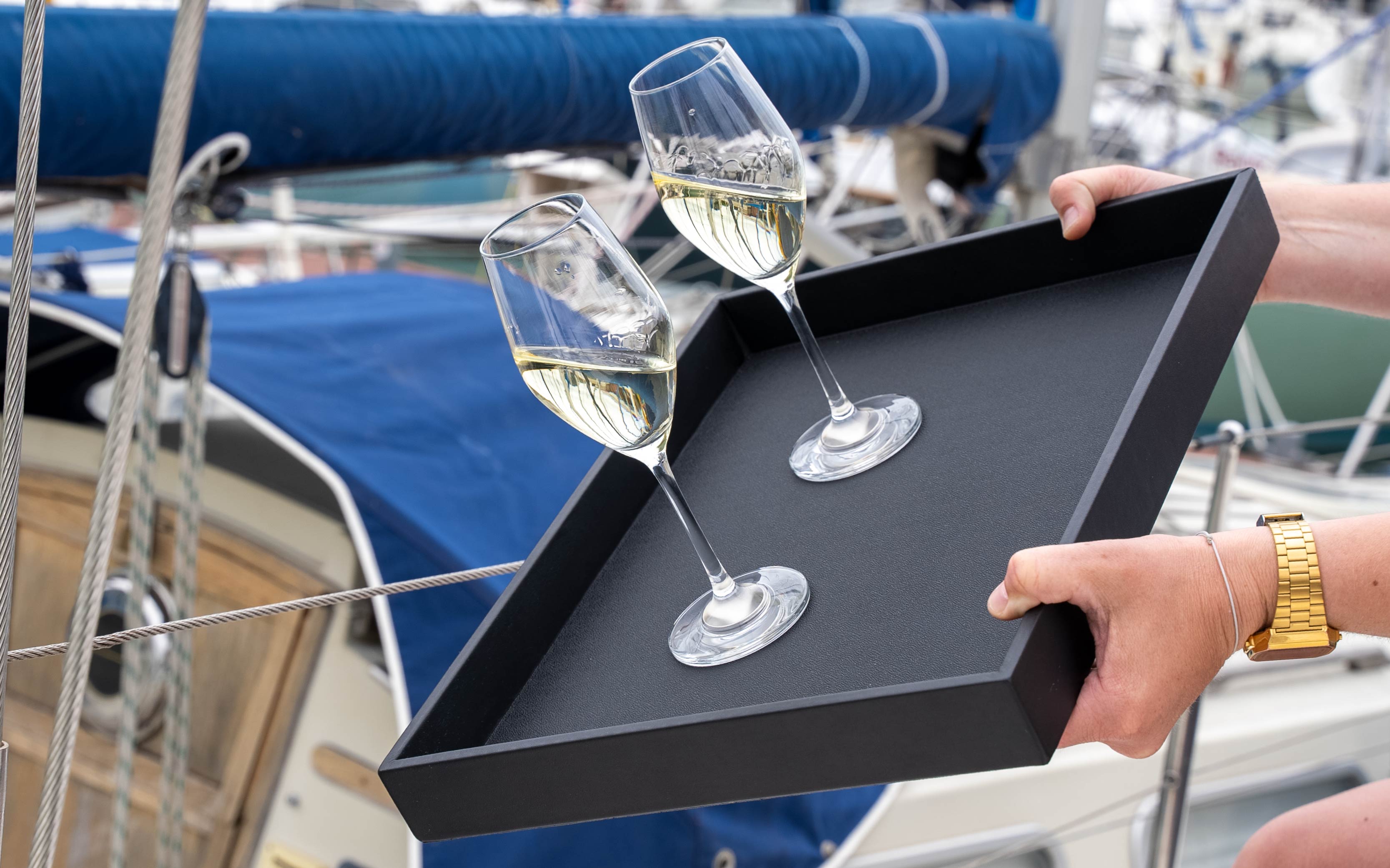 metal tray with magnetic glasses on the boat