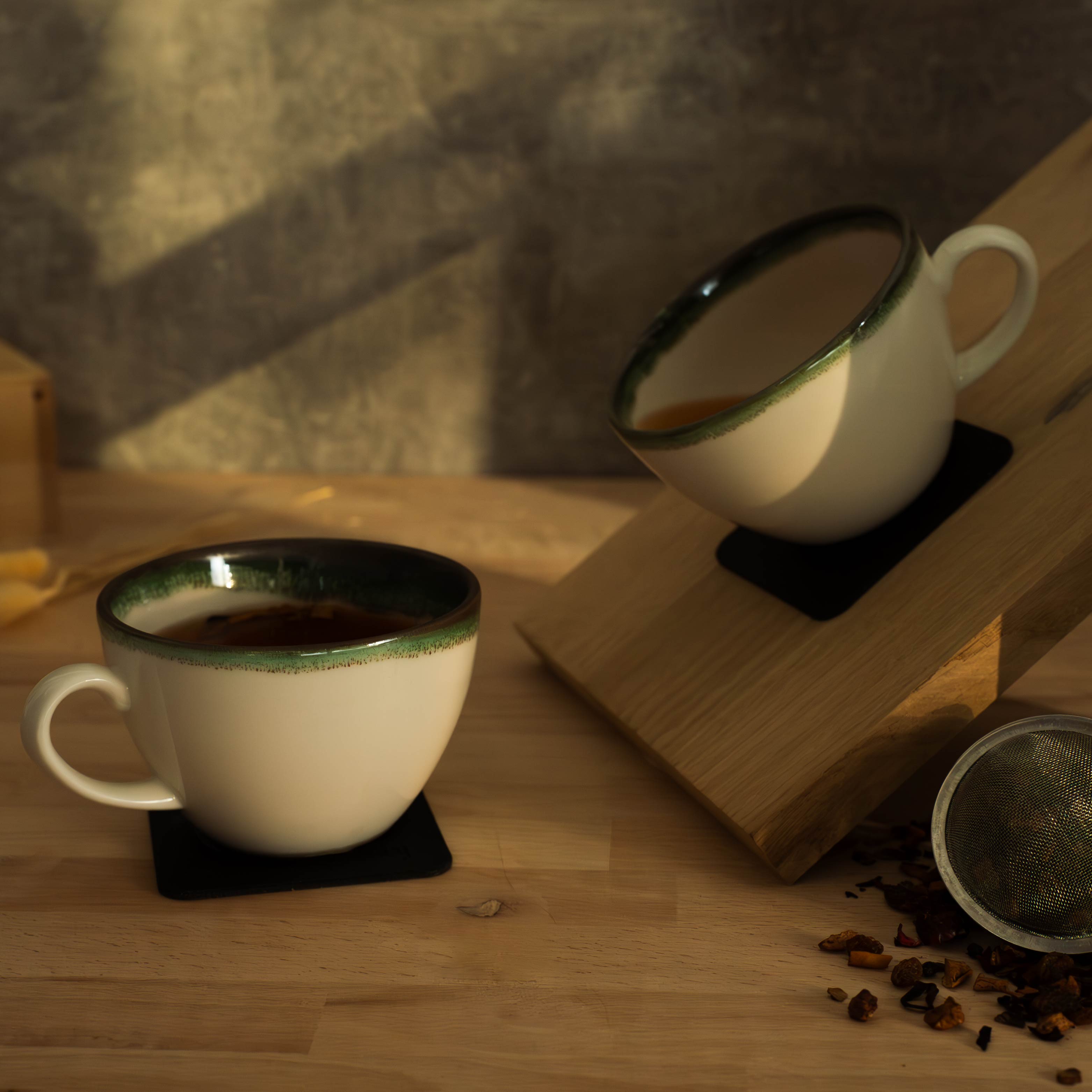 Magnetic Cups fixed on metal pads in an inclined position