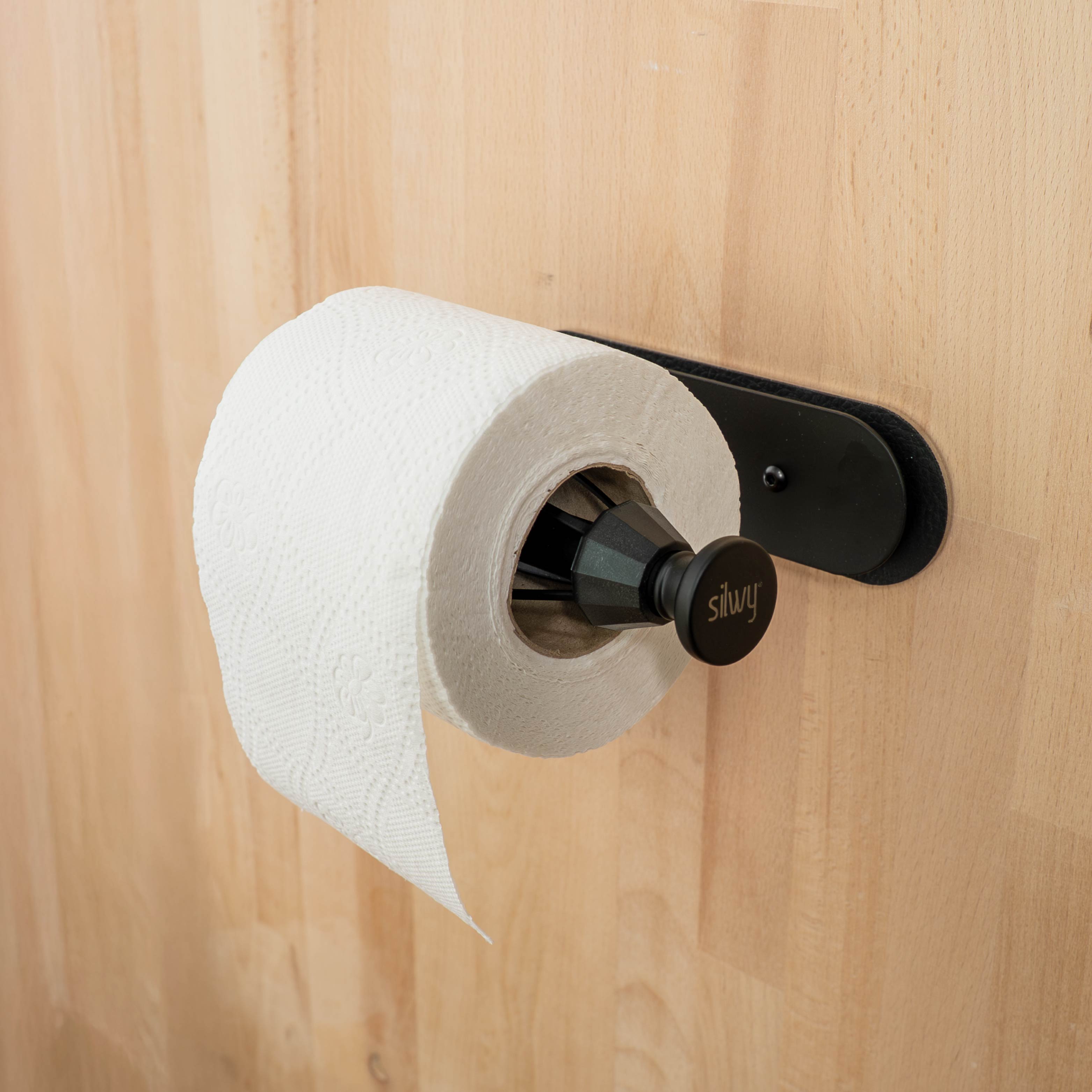 Toilet roll holder on ledge, wooden base