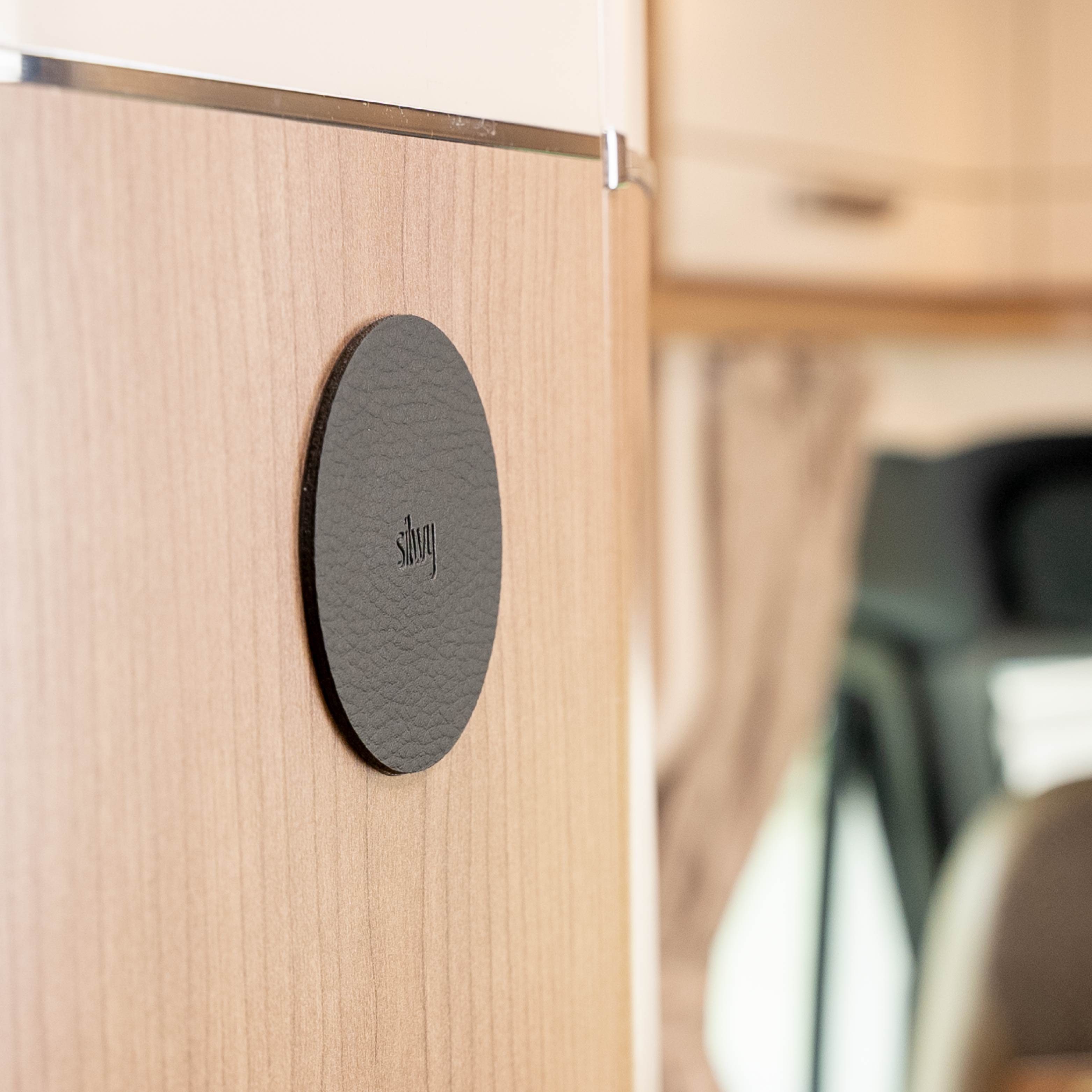 Round Metal-Nano-Gel-Pad black on wall 