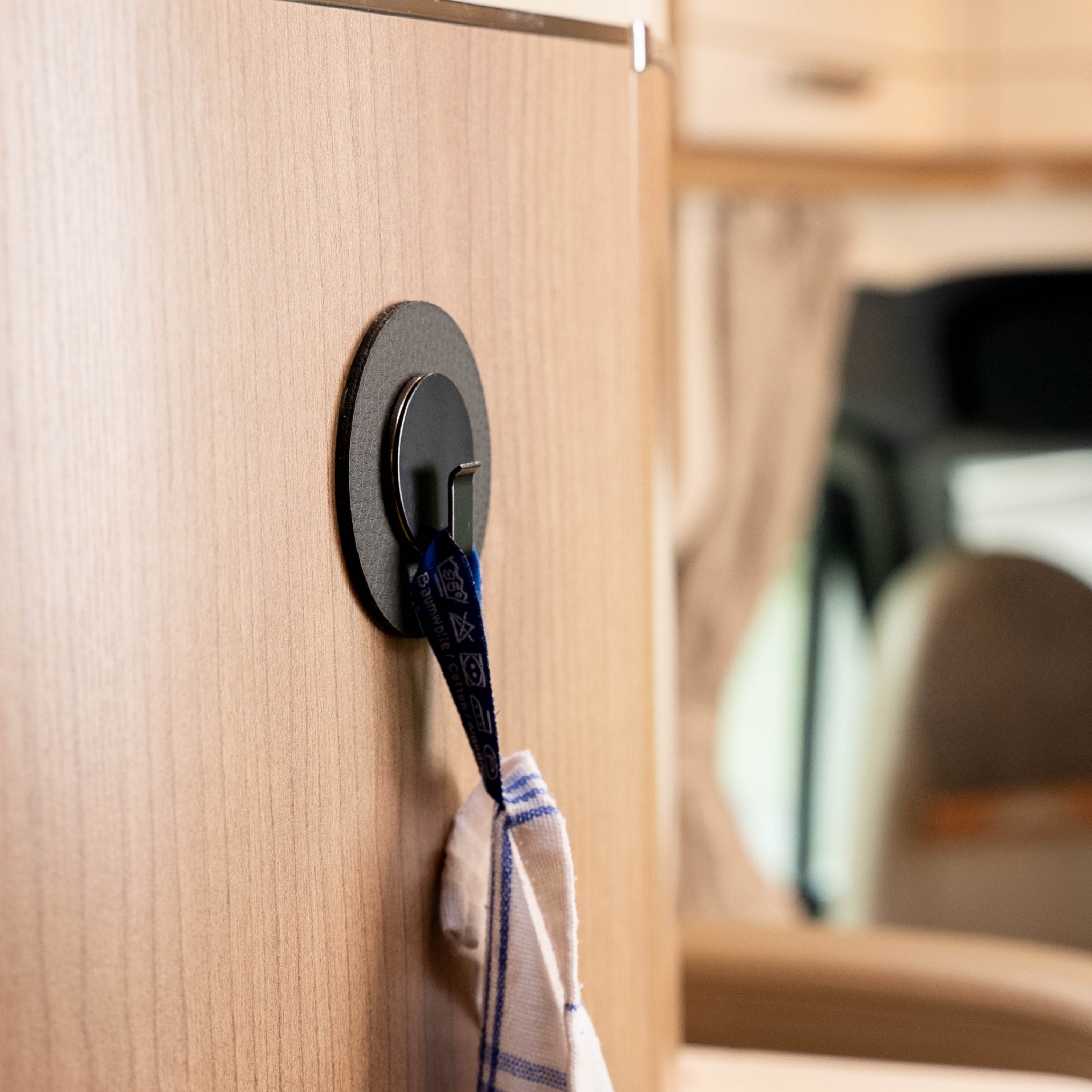 Application: Dish towel is fixed by hook Clever in combination with the pad in a camper