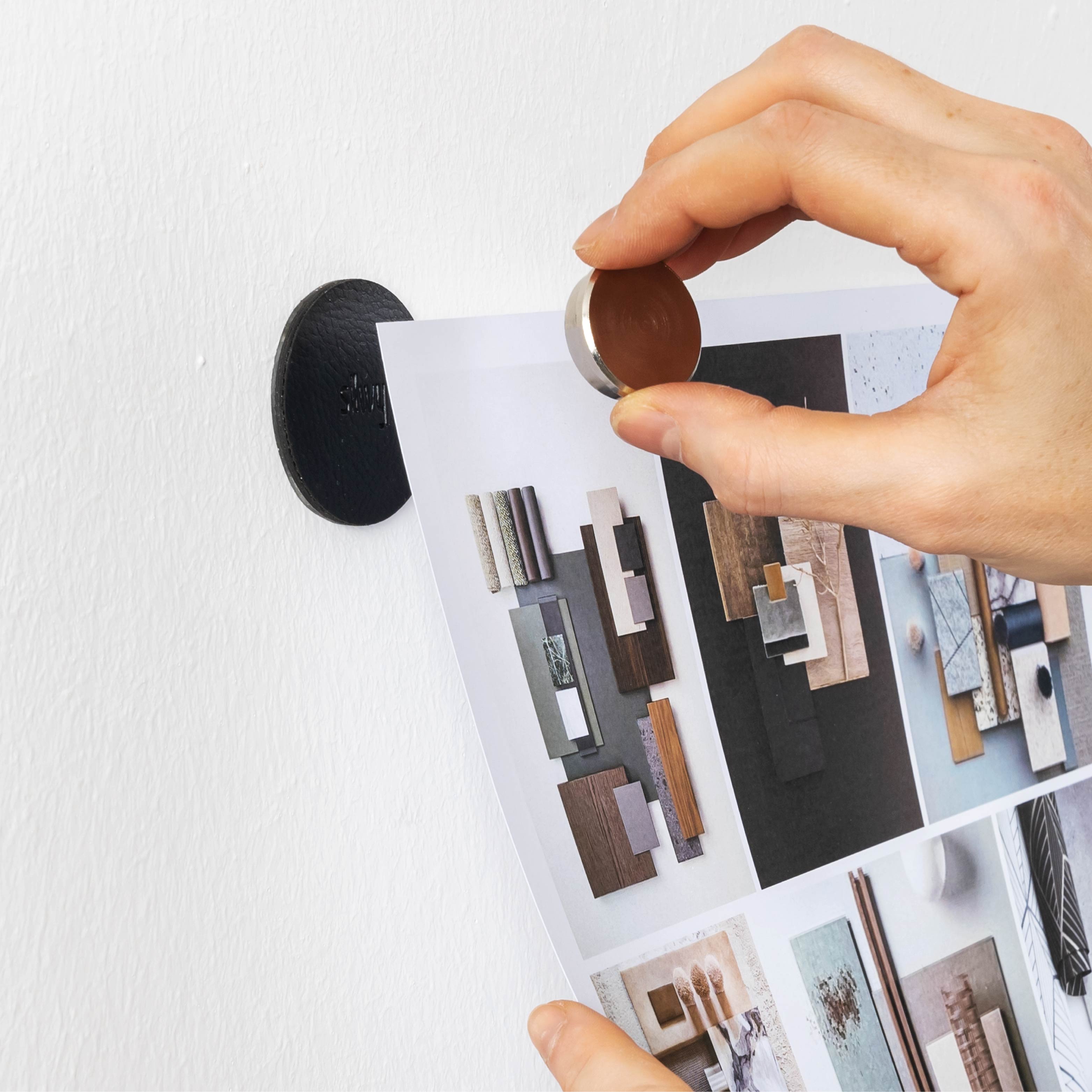 Smart magnetic pin is held in place by a metal pad
